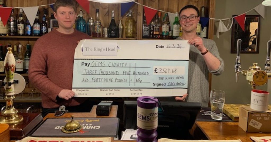Gems Charity cheque from The Kings Head, Smeeton Westerby